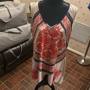 Retailer: Macys Colors: orange, blue and crème tunic
